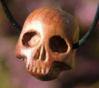Yew skull pendant
