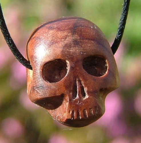 Yew skull pendant