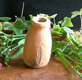 Wheat-stamped witch bottle