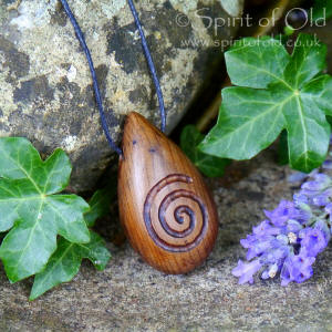 Irish bog yew spiral amulet