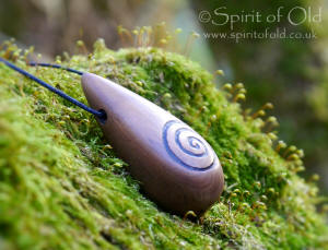 Irish bog yew spiral amulet
